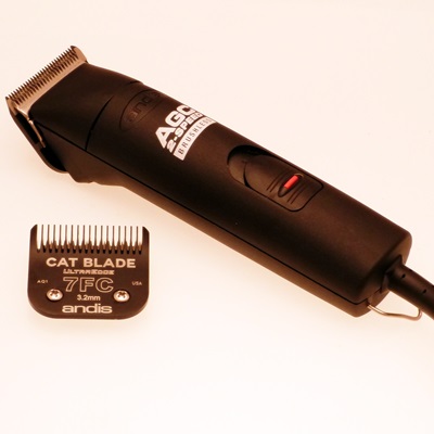 Andis AGCB 2 speed clipper with size 10 & 7FC cat blades