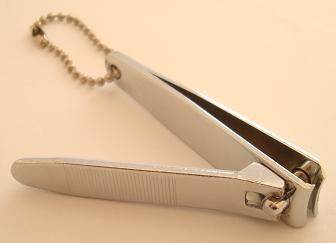 Folding nail clipper